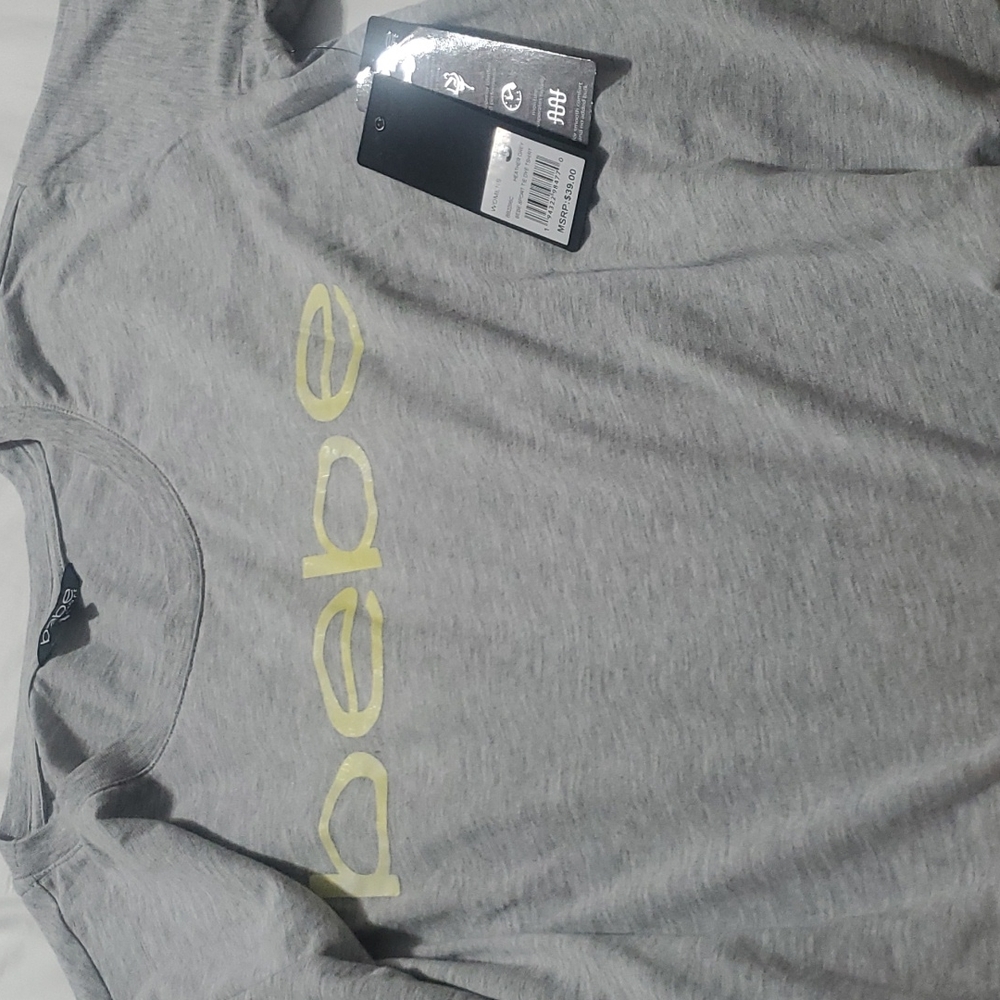 Bebe sport thirt NWT. size S